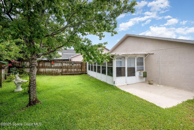 3033 Dunhill Dr, Cocoa, FL 32926 - fenced backyard featuring a sunroom, a patio area, and cooling unit