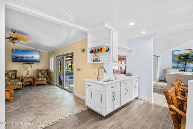2945 Newfound Harbor Dr, Merritt Island, FL 32952 - kitchen featuring vaulted ceiling, open floor plan, wooden ceiling, open shelves, and white cabinets