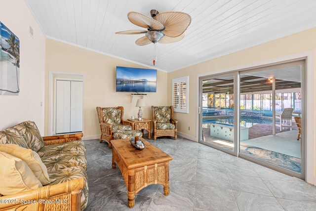 2945 Newfound Harbor Dr, Merritt Island, FL 32952 - living area featuring crown molding, ceiling fan, wooden ceiling, and lofted ceiling