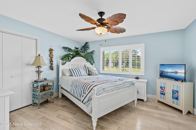 2945 Newfound Harbor Dr, Merritt Island, FL 32952 - bedroom featuring light wood-type flooring and ceiling fan