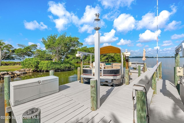 2945 Newfound Harbor Dr, Merritt Island, FL 32952 - dock with boat lift and a water view