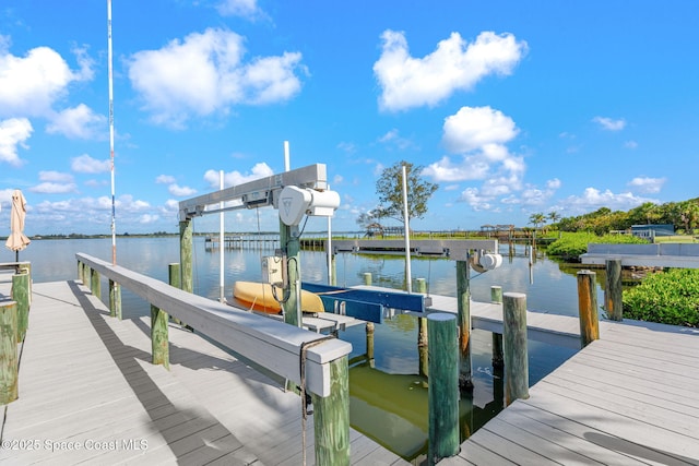 2945 Newfound Harbor Dr, Merritt Island, FL 32952 - dock featuring a water view and boat lift