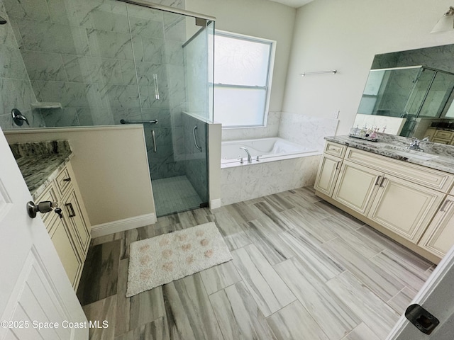 1305 Rabbit Street Se Port Malabar Unit 22, Palm Bay, FL 32909 - full bath featuring vanity, a stall shower, and a bath