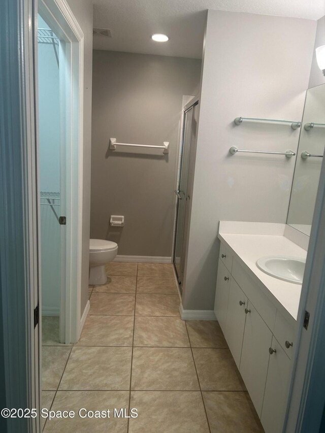 537 6th St, Vero Beach, FL 32962 - bathroom featuring vanity, a stall shower, and tile patterned floors
