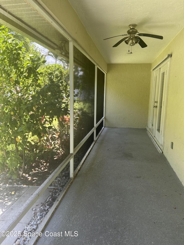 537 6th St, Vero Beach, FL 32962 - unfurnished sunroom featuring a ceiling fan