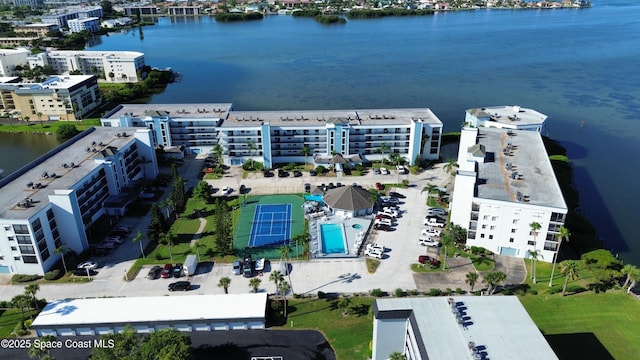 3609 S Banana River Blvd Unit C511, Cocoa Beach, FL 32931 - drone / aerial view of apartment complex / building and a large body of water