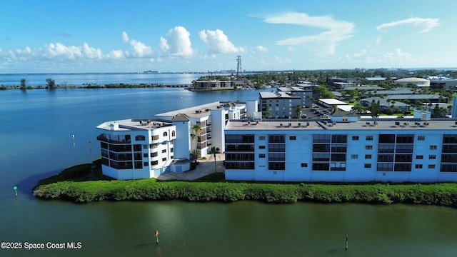 3609 S Banana River Blvd Unit C511, Cocoa Beach, FL 32931 - bird's eye view of a nearby body of water and apartment complex