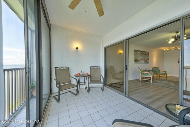 3609 S Banana River Blvd Unit C511, Cocoa Beach, FL 32931 - sunroom featuring a water view
