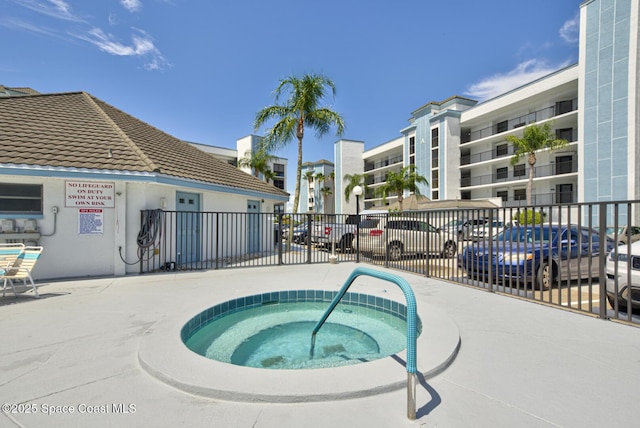 3609 S Banana River Blvd Unit C511, Cocoa Beach, FL 32931 - view of pool featuring a hot tub