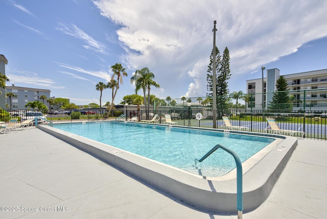 3609 S Banana River Blvd Unit C511, Cocoa Beach, FL 32931 - community pool with a patio area