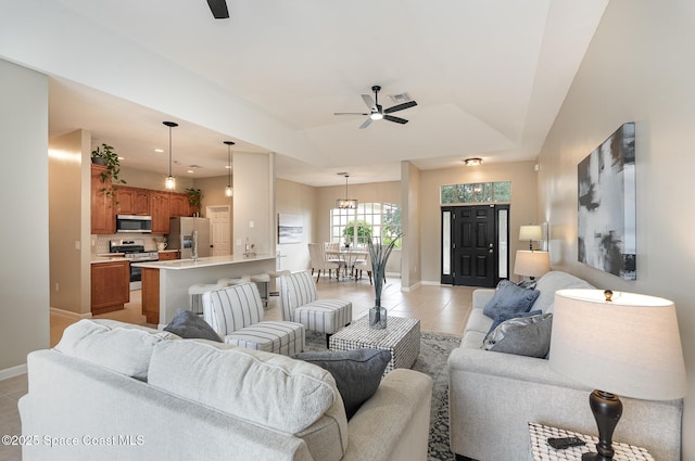 130 Cameron St SE, Palm Bay, FL 32909 - living room with a ceiling fan, light tile patterned flooring, and recessed lighting