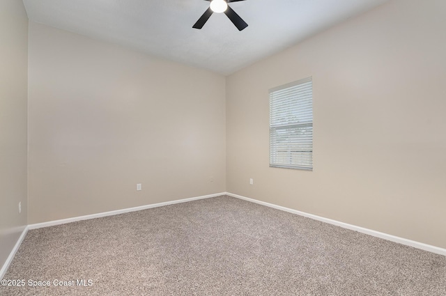 130 Cameron St SE, Palm Bay, FL 32909 - carpeted empty room with ceiling fan and baseboards