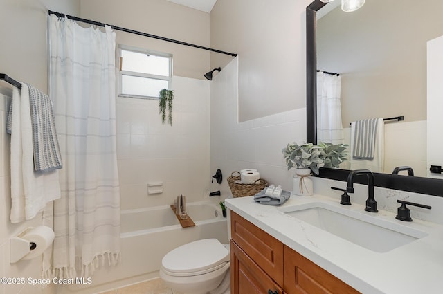 130 Cameron St SE, Palm Bay, FL 32909 - full bathroom featuring vanity, shower / bathtub combination with curtain, and tile walls