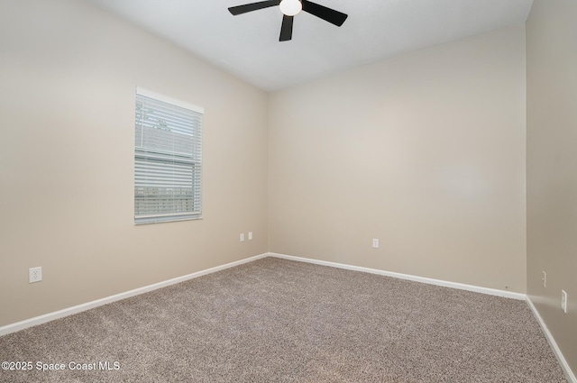 130 Cameron St SE, Palm Bay, FL 32909 - carpeted spare room with ceiling fan and baseboards