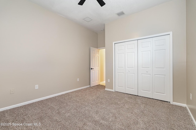 130 Cameron St SE, Palm Bay, FL 32909 - unfurnished bedroom featuring carpet flooring, a closet, and ceiling fan
