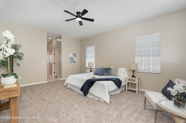130 Cameron St SE, Palm Bay, FL 32909 - carpeted bedroom with baseboards and ceiling fan