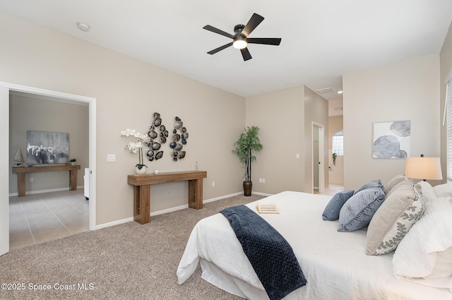 130 Cameron St SE, Palm Bay, FL 32909 - carpeted bedroom with baseboards and a ceiling fan