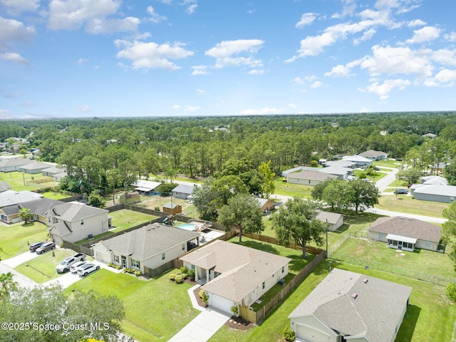 130 Cameron St SE, Palm Bay, FL 32909 - aerial view of residential area with a heavily wooded area