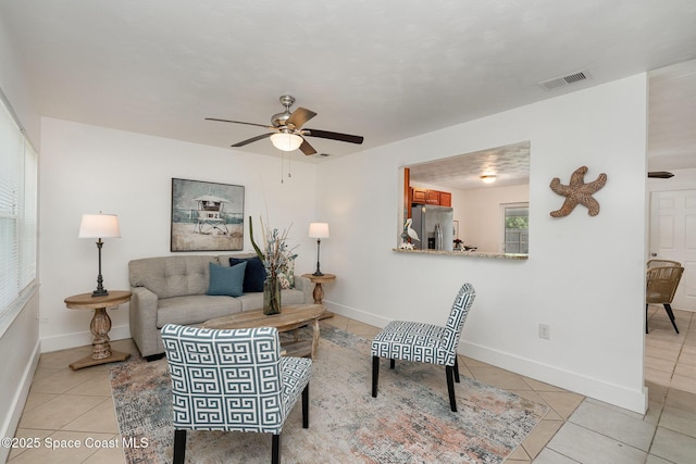 2515 Andrews Ave, Melbourne, FL 32935 - living room with a ceiling fan and light tile patterned floors