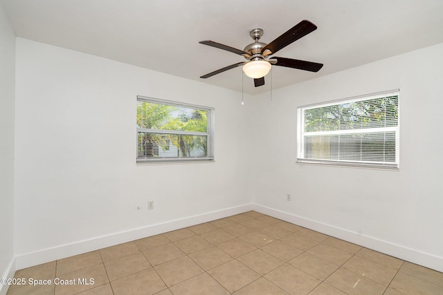 2515 Andrews Ave, Melbourne, FL 32935 - spare room with healthy amount of natural light, ceiling fan, and light tile patterned floors