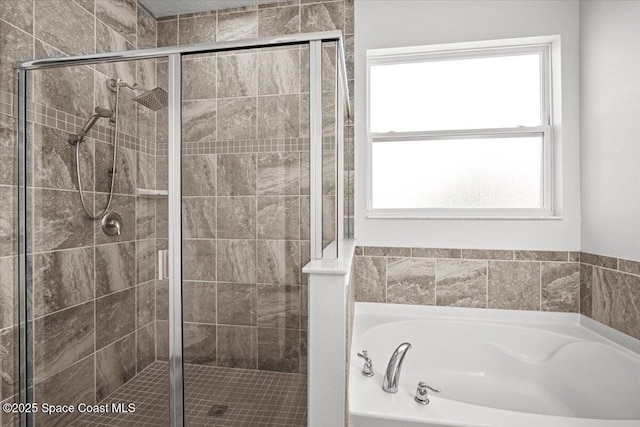 922 Raleigh Rd SE, Palm Bay, FL 32909 - full bath featuring a bath and a shower stall