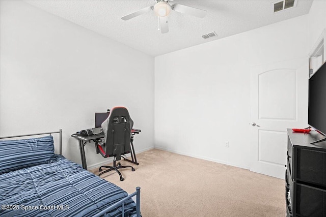 922 Raleigh Rd SE, Palm Bay, FL 32909 - bedroom with carpet, a textured ceiling, and ceiling fan