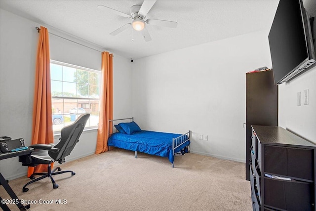 922 Raleigh Rd SE, Palm Bay, FL 32909 - carpeted bedroom with an office area and a ceiling fan