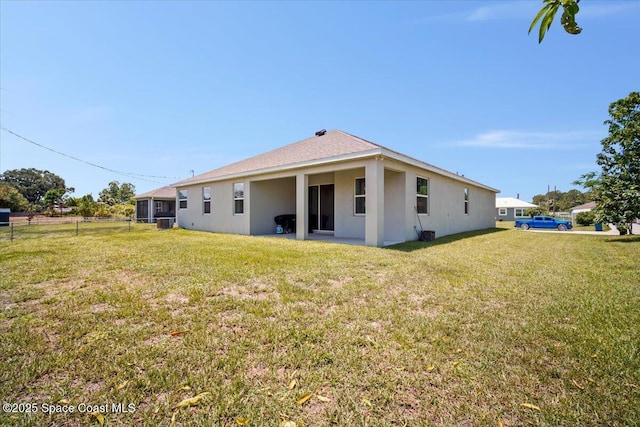 922 Raleigh Rd SE, Palm Bay, FL 32909 - rear view of property featuring stucco siding