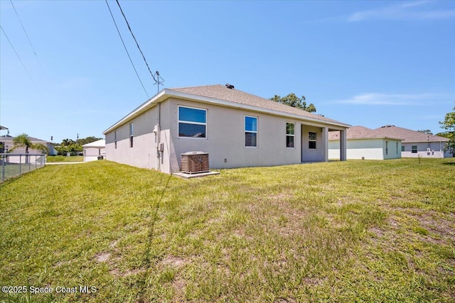 922 Raleigh Rd SE, Palm Bay, FL 32909 - rear view of house featuring stucco siding