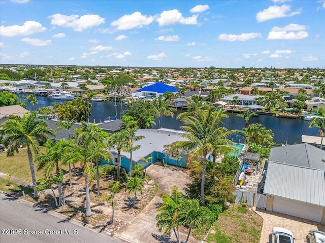 443 Aruba Ct, Satellite Beach, FL 32937 - aerial perspective of suburban area with a large body of water