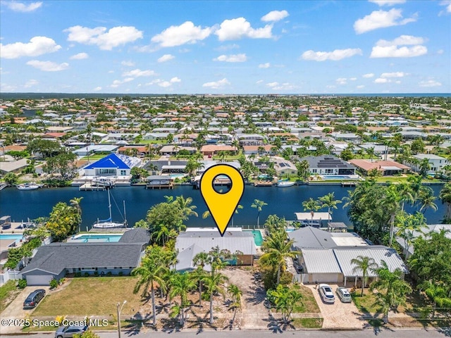 443 Aruba Ct, Satellite Beach, FL 32937 - aerial perspective of suburban area with a nearby body of water