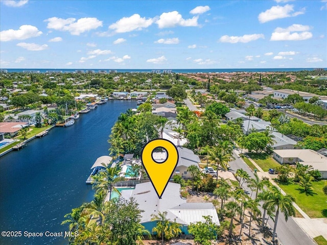 443 Aruba Ct, Satellite Beach, FL 32937 - aerial perspective of suburban area with a nearby body of water