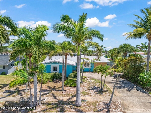 443 Aruba Ct, Satellite Beach, FL 32937 - view of front of house with concrete driveway
