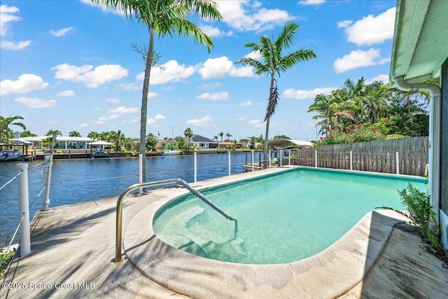 443 Aruba Ct, Satellite Beach, FL 32937 - view of pool featuring a water view and a boat dock