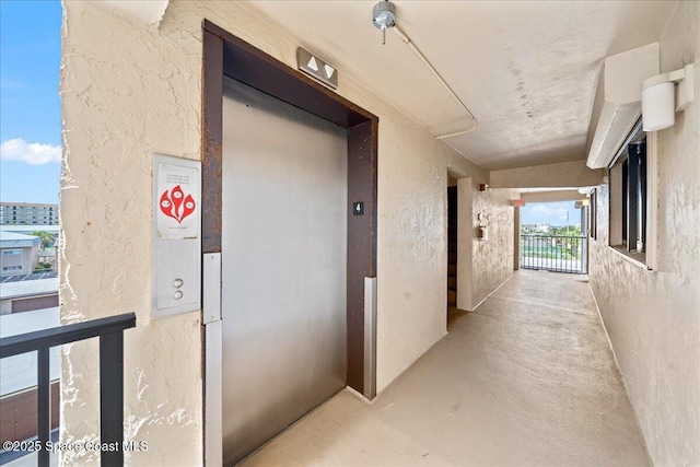 3170 N Atlantic Ave Unit 412, Cocoa Beach, FL 32931 - corridor with elevator