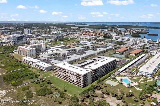 3170 N Atlantic Ave Unit 412, Cocoa Beach, FL 32931 - view of urban area with a nearby body of water and a pool