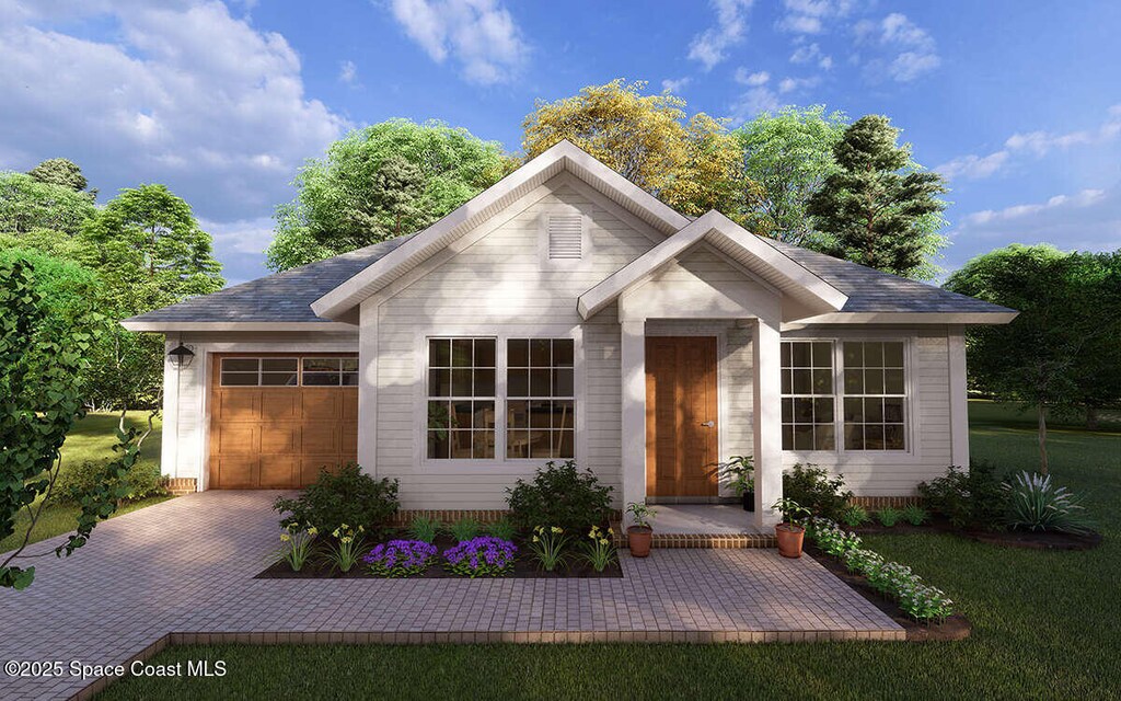 258 Lime St, Cocoa, FL 32926 - single story home featuring a garage and decorative driveway
