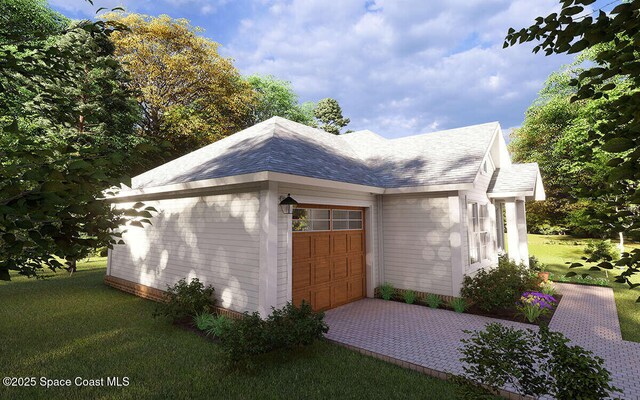 258 Lime St, Cocoa, FL 32926 - view of property exterior featuring an attached garage, a lawn, roof with shingles, and driveway