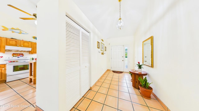 3200 Grant Rd, Grant-Valkaria, FL 32949 - foyer entrance with light tile patterned floors and a ceiling fan