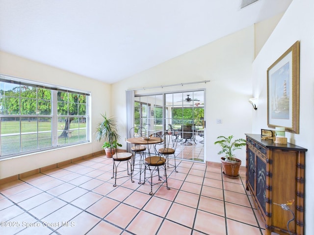 3200 Grant Rd, Grant-Valkaria, FL 32949 - dining room featuring vaulted ceiling and light tile patterned floors
