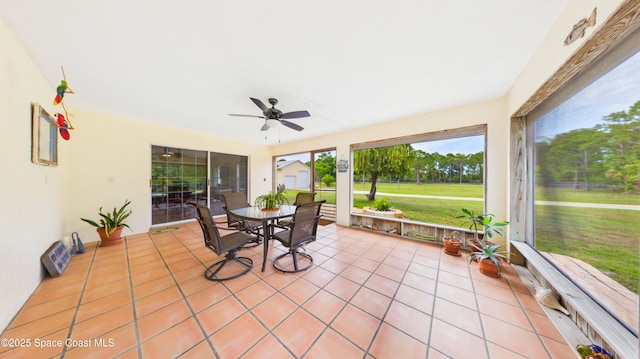 3200 Grant Rd, Grant-Valkaria, FL 32949 - sunroom featuring ceiling fan and outdoor dining space