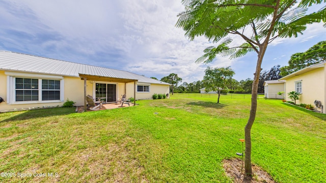 3200 Grant Rd, Grant-Valkaria, FL 32949 - view of yard featuring a patio