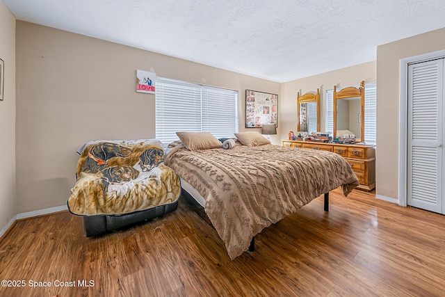 1714 Blanche Ave, Melbourne, FL 32934 - bedroom featuring wood finished floors and baseboards