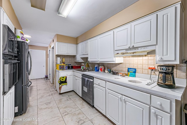 1714 Blanche Ave, Melbourne, FL 32934 - kitchen featuring stainless steel dishwasher, white electric stovetop, under cabinet range hood, and white cabinetry