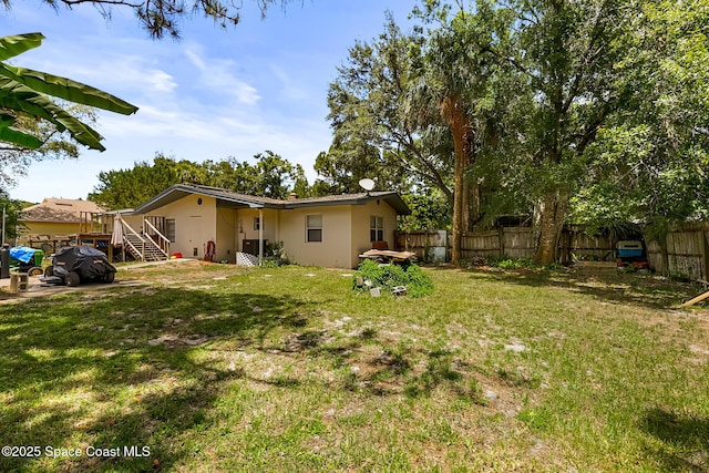 1714 Blanche Ave, Melbourne, FL 32934 - view of yard featuring stairs