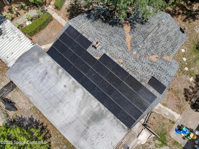1714 Blanche Ave, Melbourne, FL 32934 - exterior view of roof with shingles and a central AC unit