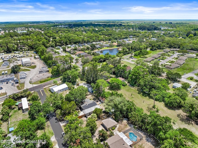 1714 Blanche Ave, Melbourne, FL 32934 - aerial view of residential area featuring a nearby body of water and a tree filled landscape