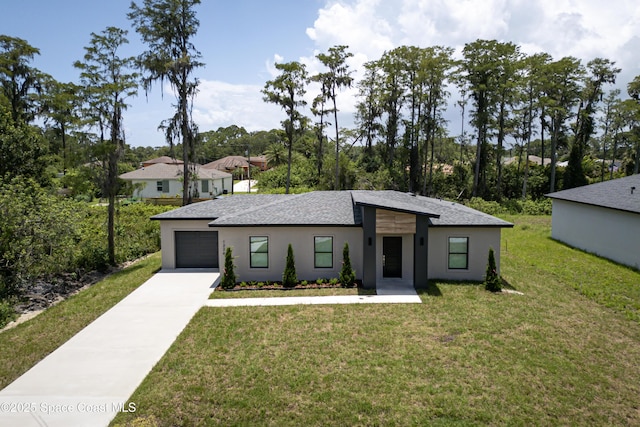 1326 Sagbloom St SE, Palm Bay, FL 32909 - view of front facade with concrete driveway, a front yard, a garage, stucco siding, and a shingled roof