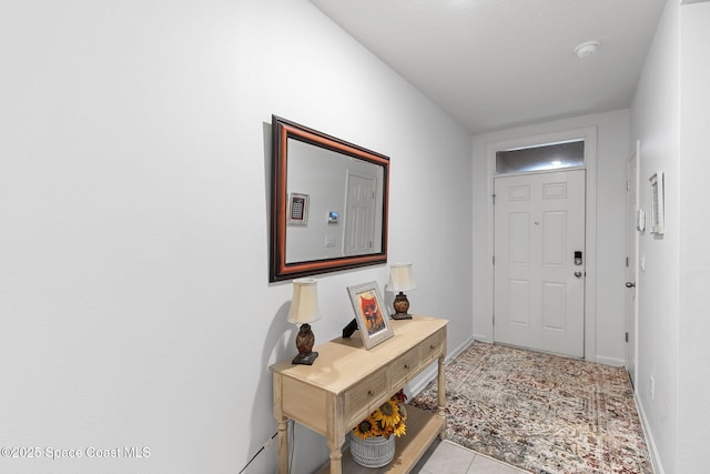 3724 Sandhill Crane Cir, Mims, FL 32754 - entryway with light tile patterned flooring and baseboards