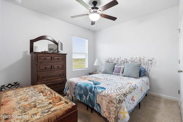 3724 Sandhill Crane Cir, Mims, FL 32754 - carpeted bedroom with a ceiling fan and baseboards